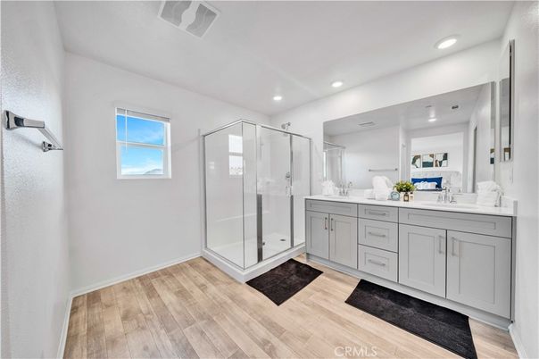 Bathroom, Dual Sink Vanities, Glass Shower, Interior, Recessed Lighting, Wood Texture Flooring