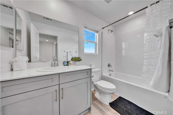 Bathroom, Dual Sink Vanities, Interior, Recessed Lighting, Wood Texture Flooring