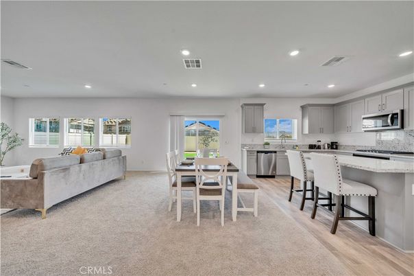 Dining room, Interior, Kitchen, Living room, Recessed Lighting, Stainless Steel Appliances, Wood Texture Flooring