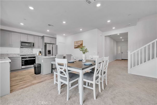 Dining room, Interior, Kitchen, Recessed Lighting, Stainless Steel Appliances, Wood Texture Flooring