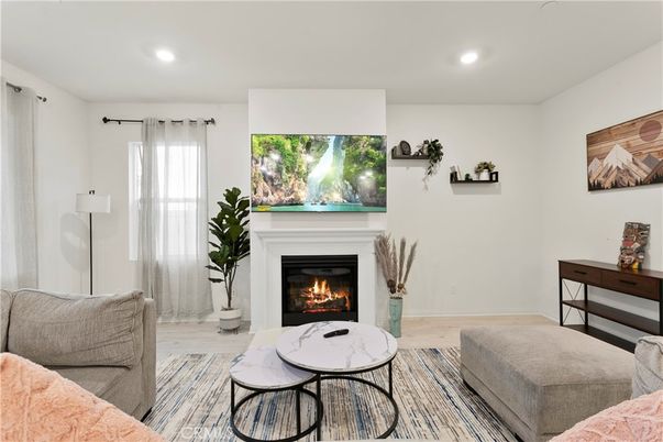 Fireplace, Interior, Living room, Recessed Lighting, Wood Texture Flooring