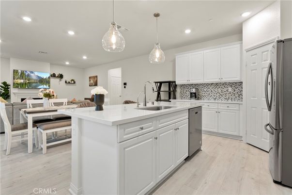 Dining room, Interior, Kitchen, Pendant Lights, Recessed Lighting, Stainless Steel Appliances, Wood Texture Flooring