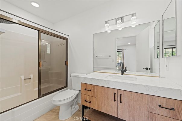 Bathroom, Glass Shower, Interior, Recessed Lighting, Wood Texture Flooring