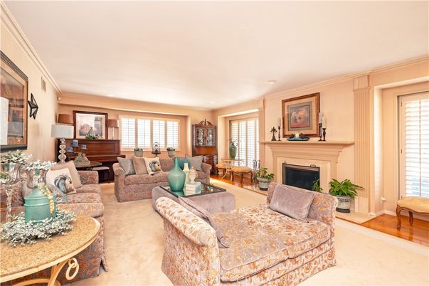 Fireplace, Interior, Living room, Piano, Recessed Lighting, Wood Texture Flooring