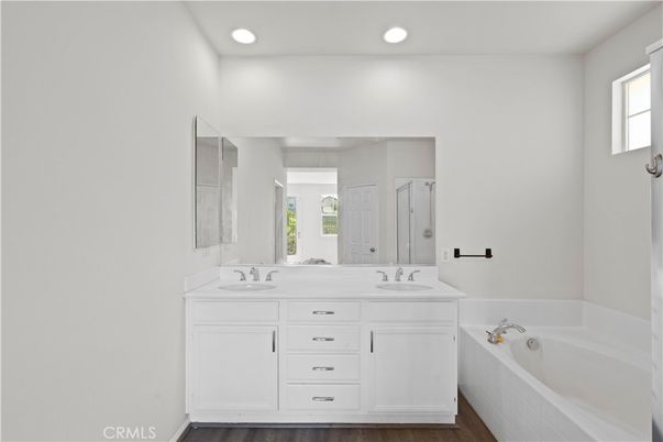 Bathroom, Dual Sink Vanities, Interior, Recessed Lighting, Wood Texture Flooring