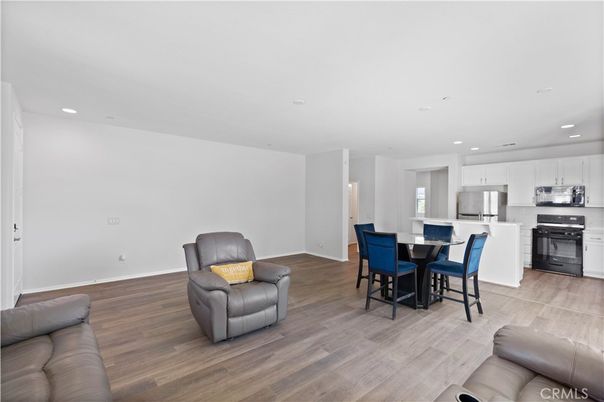 Dining room, Interior, Kitchen, Recessed Lighting, Stainless Steel Appliances, Wood Texture Flooring