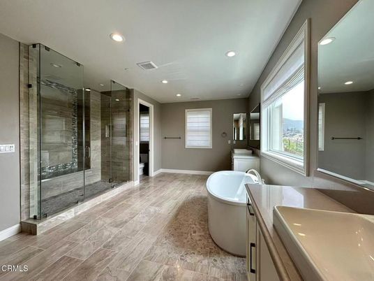 Bathroom, Free Standing Baths, Glass Shower, Interior, Recessed Lighting, Wood Texture Flooring