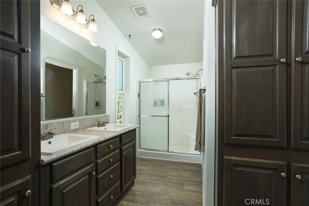 Bathroom, Dual Sink Vanities, Glass Shower, Interior, Wood Texture Flooring