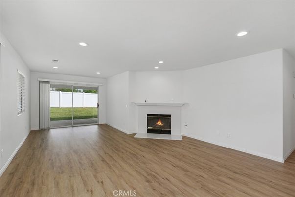 Empty room, Fireplace, Interior, Recessed Lighting, Wood Texture Flooring
