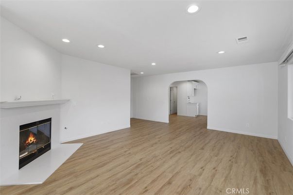 Empty room, Fireplace, Interior, Recessed Lighting, Wood Texture Flooring