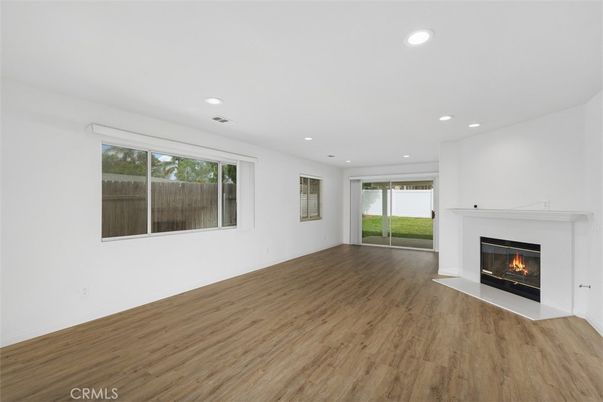 Empty room, Fireplace, Interior, Recessed Lighting, Wood Texture Flooring