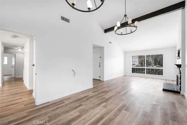 Chandelier, Empty room, Fireplace, Interior, Wood Texture Flooring