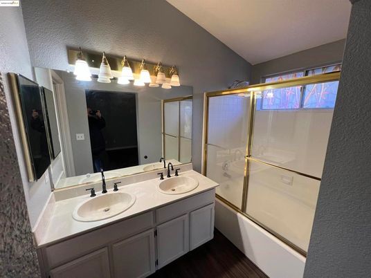 Bathroom, Dual Sink Vanities, Glass Shower, Interior, Wood Texture Flooring