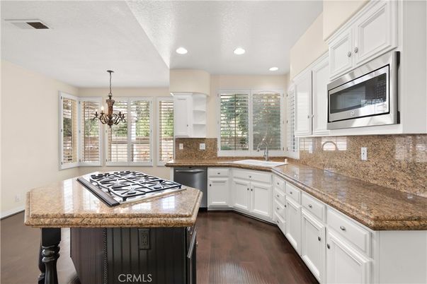 Chandelier, Interior, Kitchen, Recessed Lighting, Stainless Steel Appliances, Wood Texture Flooring