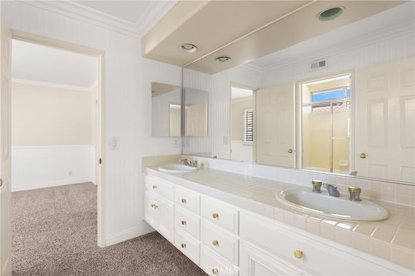 Bathroom, Dual Sink Vanities, Interior, Recessed Lighting, Tile Countertops