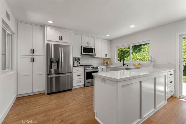 Interior, Kitchen, Recessed Lighting, Stainless Steel Appliances, Wood Texture Flooring