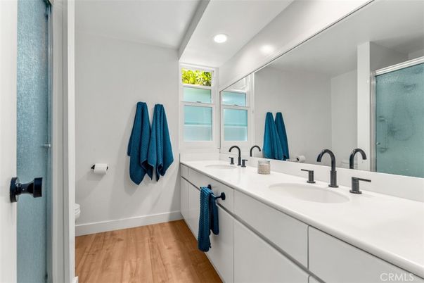 Bathroom, Dual Sink Vanities, Interior, Recessed Lighting, Wood Texture Flooring