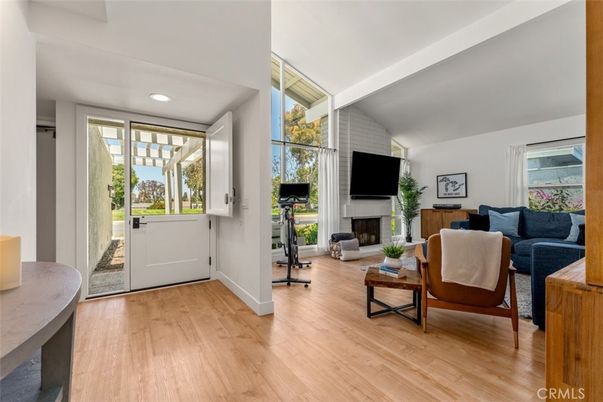 Fireplace, Fitness Equipment, Interior, Living room, Recessed Lighting, Wood Texture Flooring