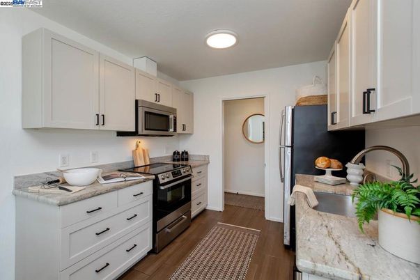 Interior, Kitchen, Recessed Lighting, Stainless Steel Appliances, Wood Texture Flooring