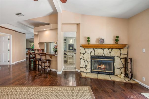 Dining room, Fireplace, Interior, Kitchen, Recessed Lighting, Wood Texture Flooring