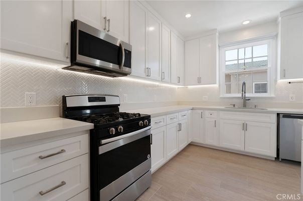 Interior, Kitchen, Recessed Lighting, Stainless Steel Appliances, Wood Texture Flooring