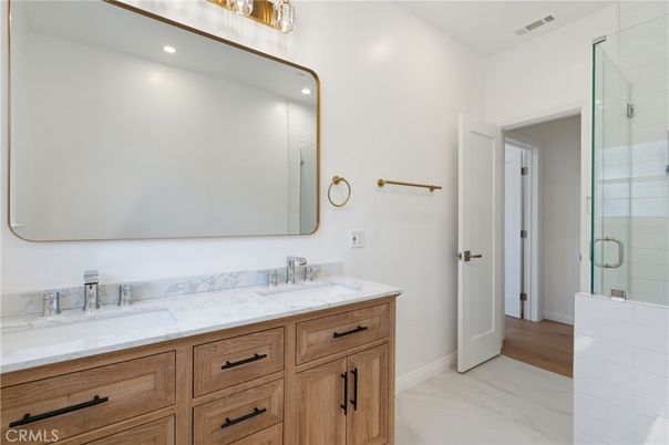 Bathroom, Dual Sink Vanities, Glass Shower, Interior, Marble, Recessed Lighting