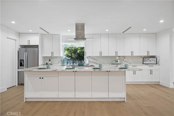 Interior, Kitchen, Marble Walls, Recessed Lighting, Stainless Steel Appliances, Wood Texture Flooring