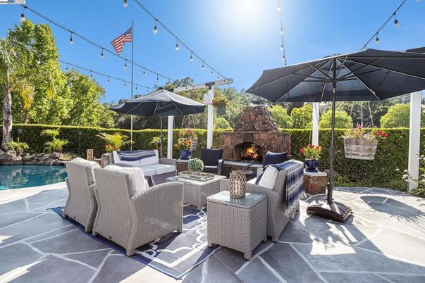 Exterior, Fireplace, Pool