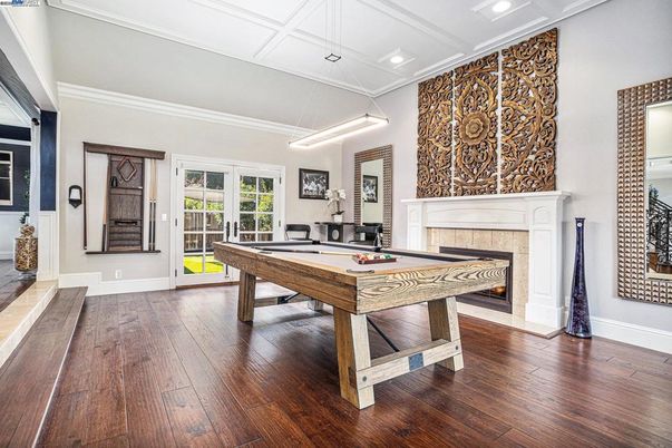 Billiard Table, Fireplace, Game Room, Interior, Pendant Lights, Recessed Lighting, Wood Texture Flooring