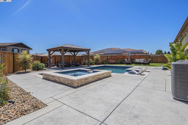 Exterior, Pool, Solar Panels