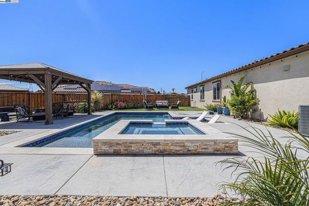 Exterior, Pool, Solar Panels