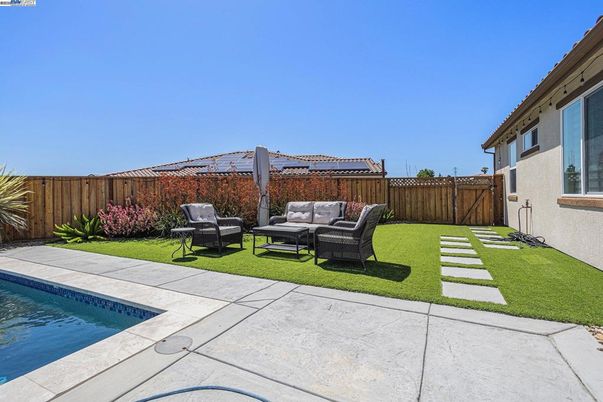 Exterior, Pool, Solar Panels