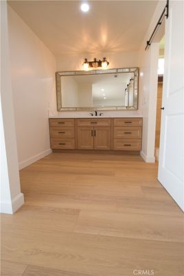 Bathroom, Dual Sink Vanities, Interior, Recessed Lighting, Wood Texture Flooring