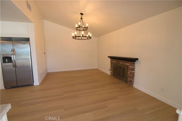 Chandelier, Empty room, Fireplace, Interior, Wood Texture Flooring