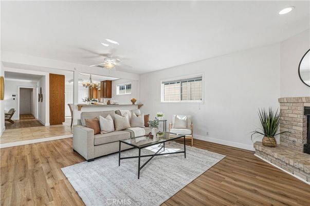 Dining room, Fireplace, Interior, Living room, Recessed Lighting, Wood Texture Flooring