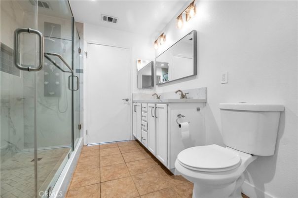 Bathroom, Dual Sink Vanities, Glass Shower, Interior, Marble Walls