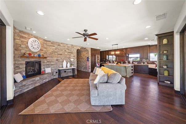 Fireplace, Interior, Kitchen, Living room, Pendant Lights, Recessed Lighting, Stone Walls, Wood Texture Flooring