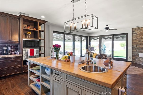 Chandelier, Interior, Kitchen, Pendant Lights, Recessed Lighting, Stone Walls, Wood Texture Flooring