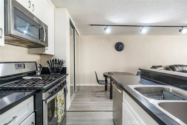 Dining room, Interior, Kitchen, Stainless Steel Appliances, Wood Texture Flooring