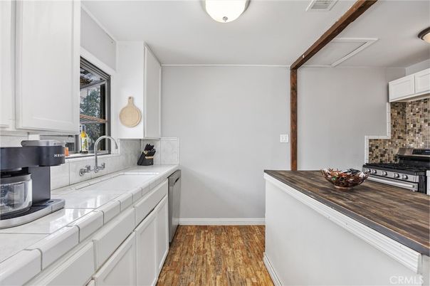 Interior, Kitchen, Tile Countertops, Wood Texture Flooring