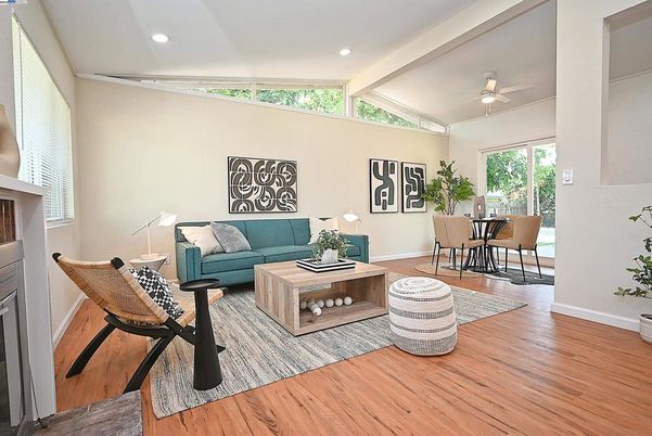 Dining room, Fireplace, Interior, Living room, Recessed Lighting, Wood Texture Flooring