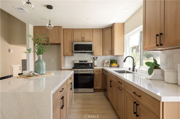 Interior, Kitchen, Pendant Lights, Recessed Lighting, Stainless Steel Appliances, Wood Texture Flooring