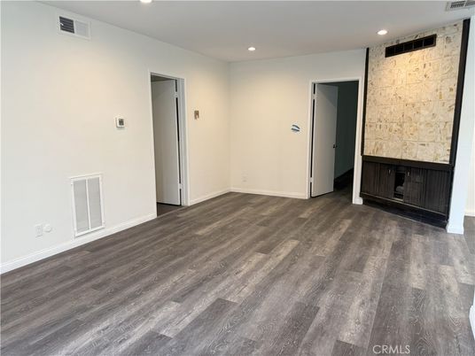 Empty room, Fireplace, Interior, Recessed Lighting, Wood Texture Flooring
