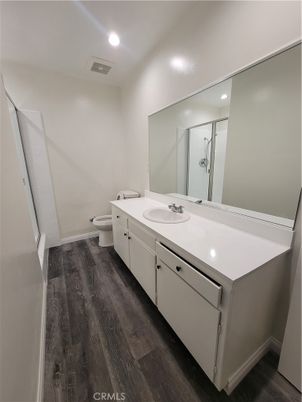 Bathroom, Dual Sink Vanities, Interior, Recessed Lighting, Wood Texture Flooring