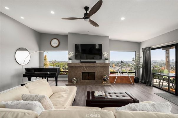 Fireplace, Interior, Living room, Piano, Recessed Lighting, Wood Texture Flooring