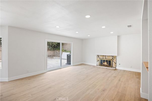 Empty room, Fireplace, Interior, Recessed Lighting, Wood Texture Flooring