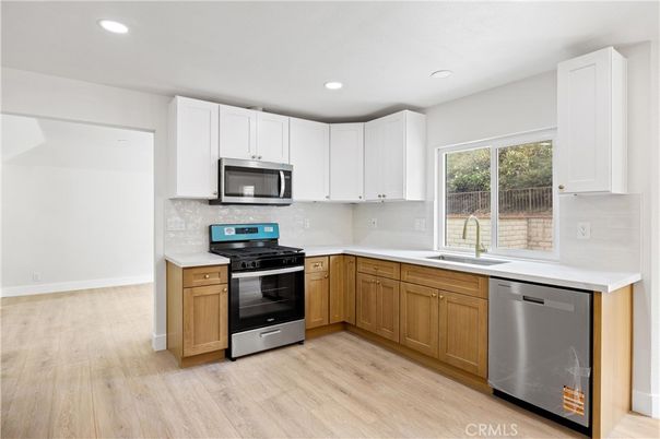 Interior, Kitchen, Recessed Lighting, Stainless Steel Appliances, Wood Texture Flooring
