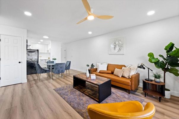 Dining room, Interior, Kitchen, Living room, Recessed Lighting, Stainless Steel Appliances, Wood Texture Flooring