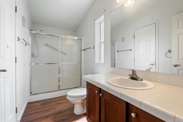 Bathroom, Glass Shower, Interior, Tile Countertops, Wood Texture Flooring