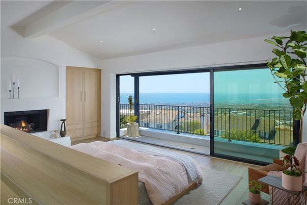 Fireplace, Interior, Recessed Lighting, Water, Wood Texture Flooring